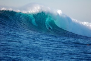 Greg Long paddles for his life, and his near miss results in a spellbinding ride. / Photo: Chris Dixon