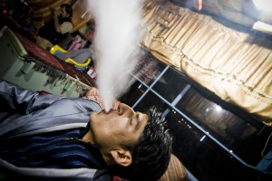 Jamal Hakimi, 21, exhales a plume of hookah smoke at Qaillon, the smoke shack near the main mosque in central Mazar-e-Sheriff. The local radio celebrity was a great guide. He was always easy to find, rocking that metallic silver sport coat. We smoked too long on the cushions in this hermetic little room. Cold oxygen hit us outside and Jamal puked in the ditch. All photos by Daniel C. Britt.
