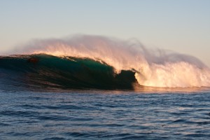 One of the waves I go out and surf getting the first morning light on it.