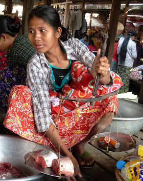 Khamti market, balancing scales with batteries