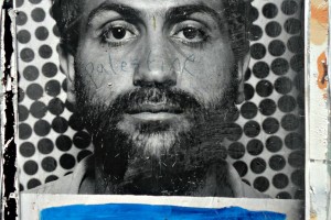 Palestinian man picture on separation wall Palestinian man picture on separation wall