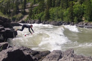 A fundamental truth in surfing and paddling is that "wherever you look, that's where you'll go." Don't look down at the hydraulics unless you want to end up getting pounded there. Instead look upstream into the seam and launch out there.