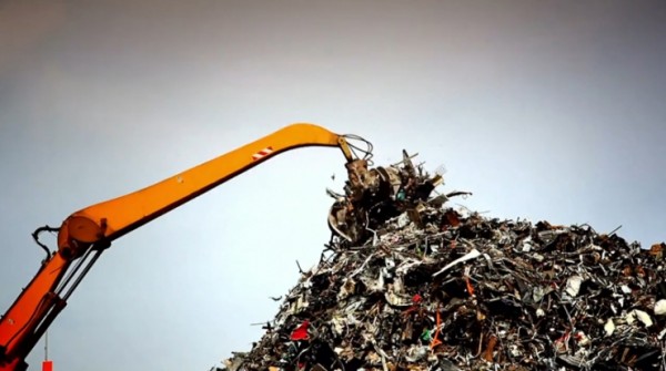 Backhoe in a landfill