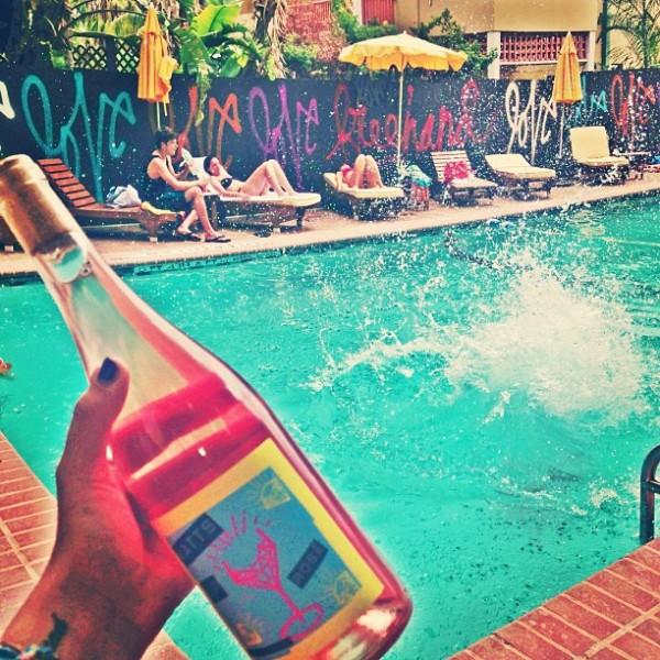 A bottle of wine beside the pool at Freehand Miami