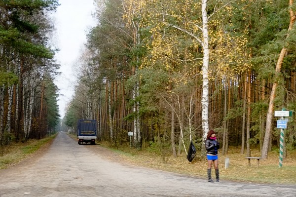 Woman on road in forest