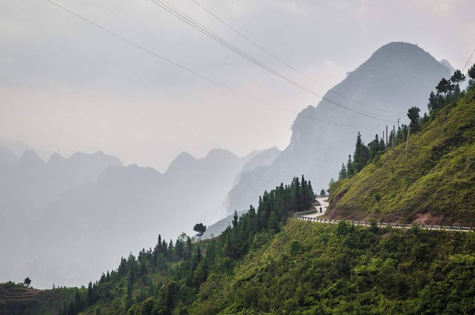 Lone biker on the Ma Pi Leng Pass– Ha Giang province