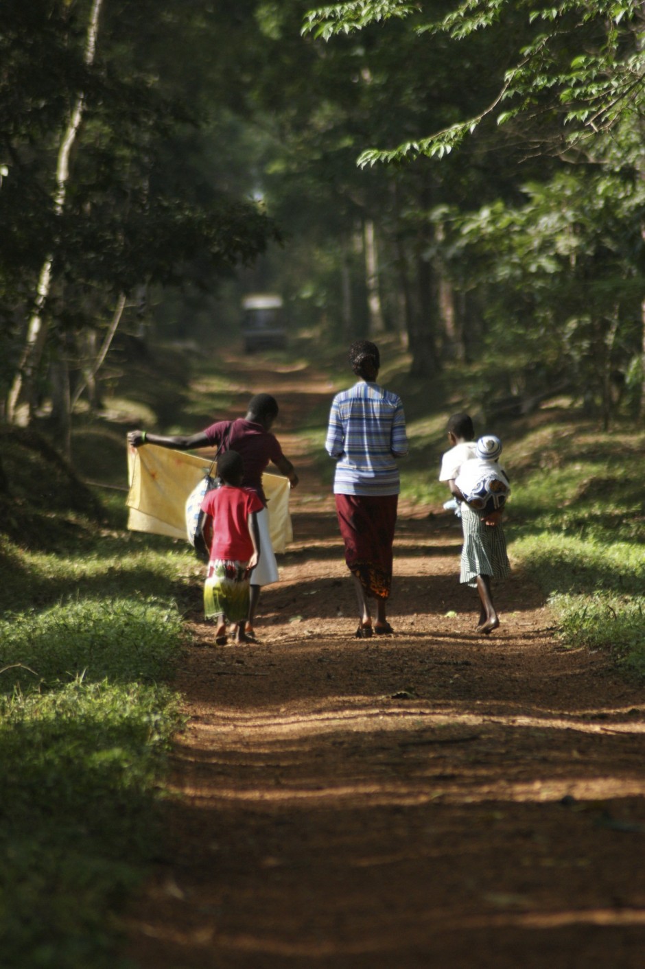 Walking to church through Budongo Forest