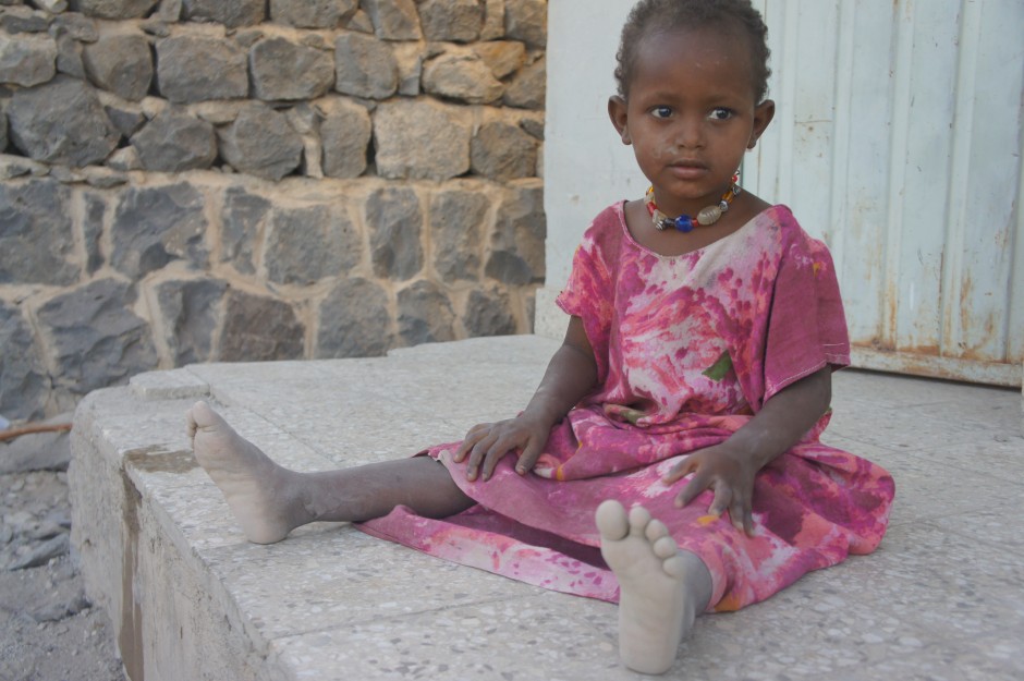 A girl in front of school