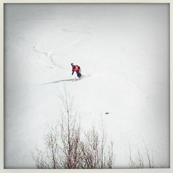 Our crew of two tele skiers, four downhill skiers, and myself, the lone split boarder make effortless turns in the spring snow.