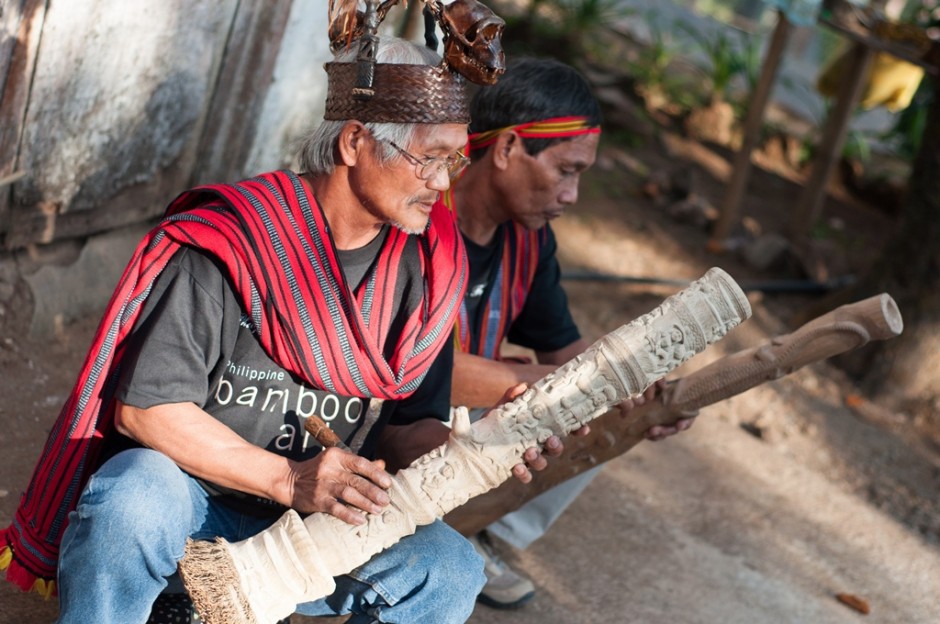 Brgy Asin Bamboo Wood Carvers working on some pieces
