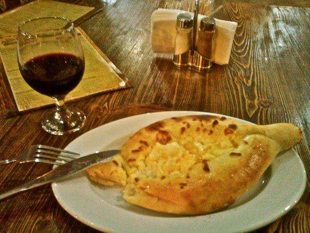 Adjaran Khachapuri - Georgian bread stuffed with cheese, egg and butter.