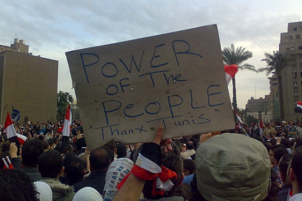 Sign in Egypt saying Power of the People, thanx Tunis