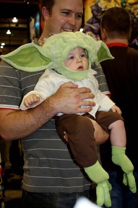 Baby dressed as Yoda