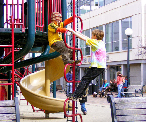 Kids playing on a climbing frame