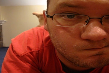 Geeky, pensive looking guy