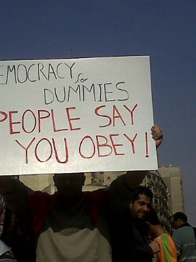 sign saying democracy for dummies, Egypt
