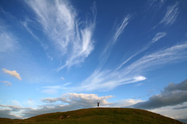 Happy on the hill under big sky