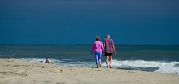 Couple walking on the beach