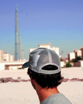 Looking over sand and skyscrapers