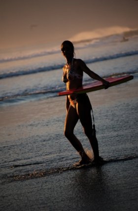 Surfer girl in Bali
