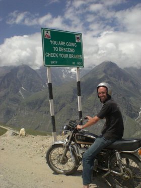 Descending a Himalayan pass on a motorbike