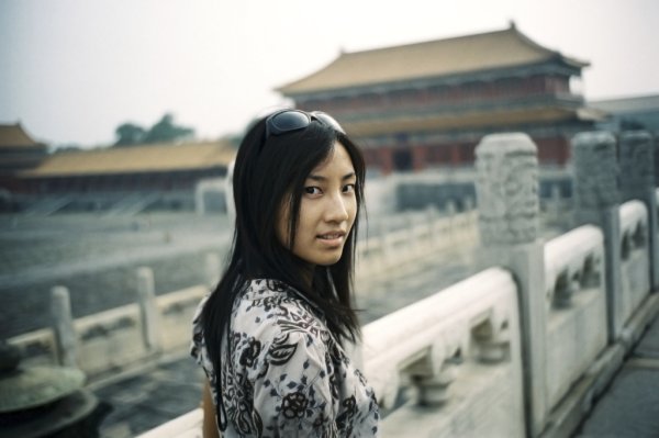Woman in front of the Forbidden City, Beijing