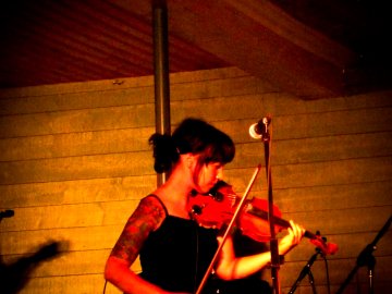 Violinist playing in St. John's