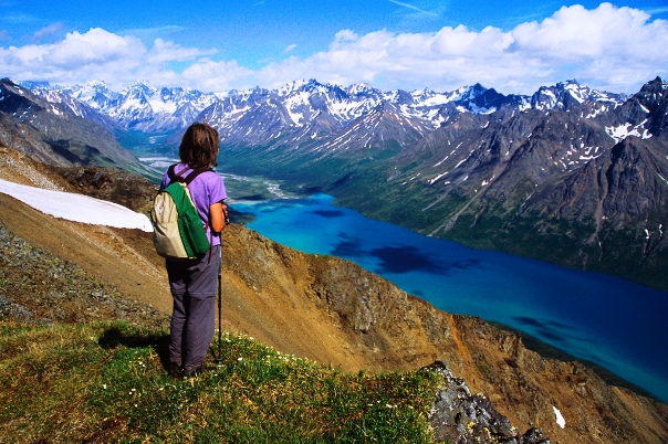 hiker over looking river gorge