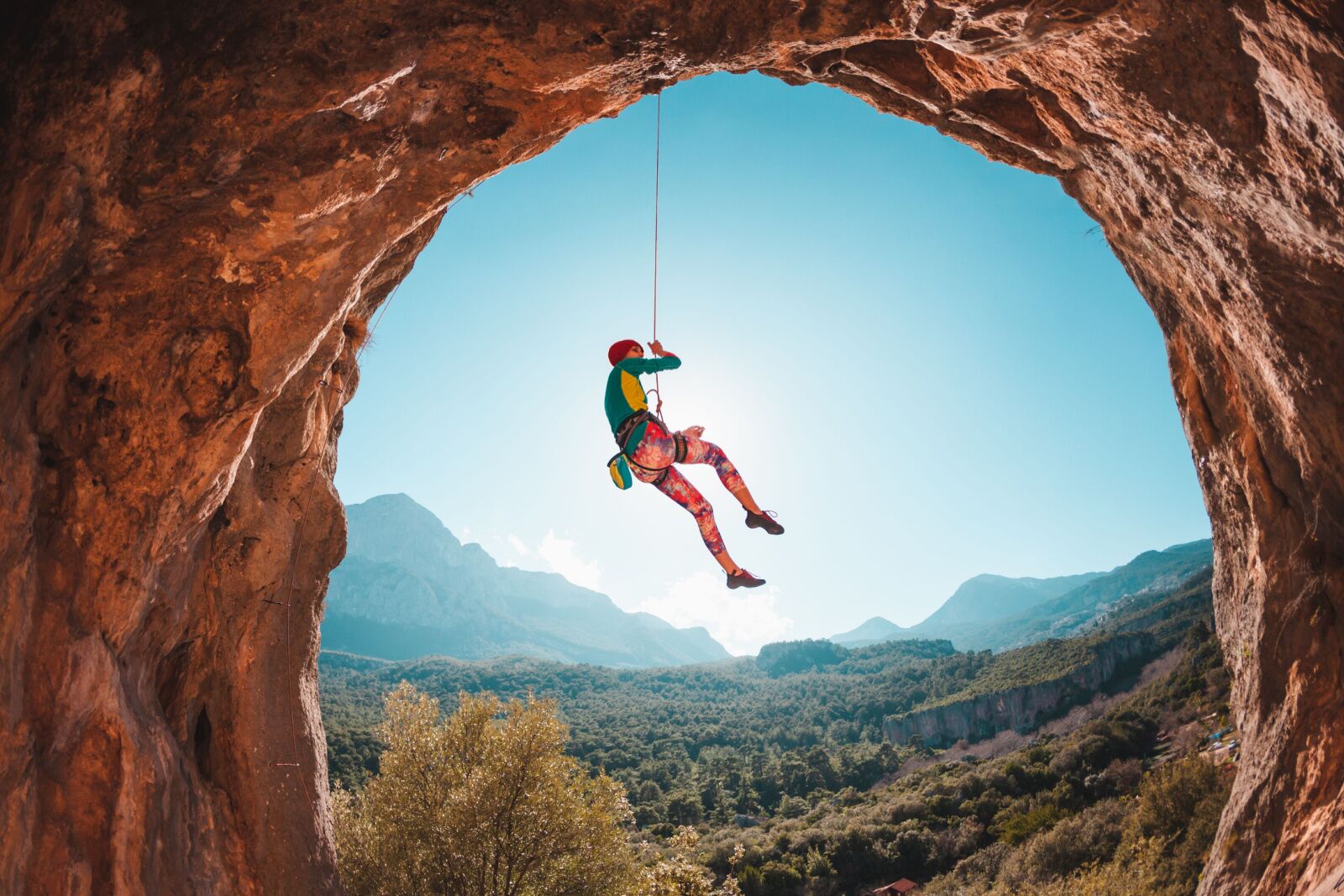 best climbing towns - girl on rope in turkey
