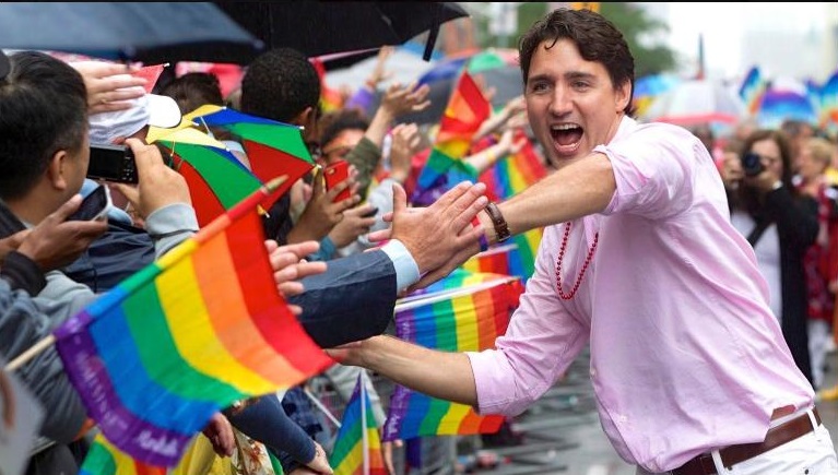 image of justin trudeau with the gay pride flag