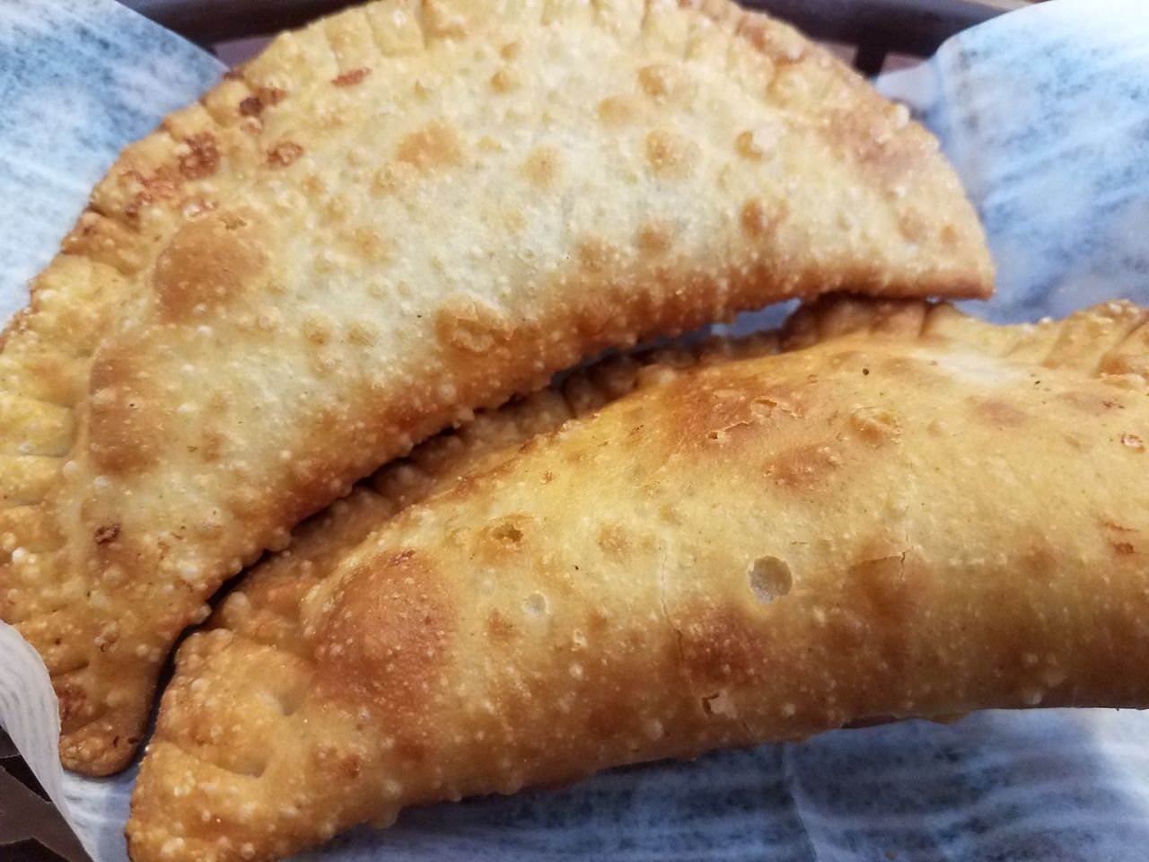 up close shot of two empanadas-Puerto Rican food