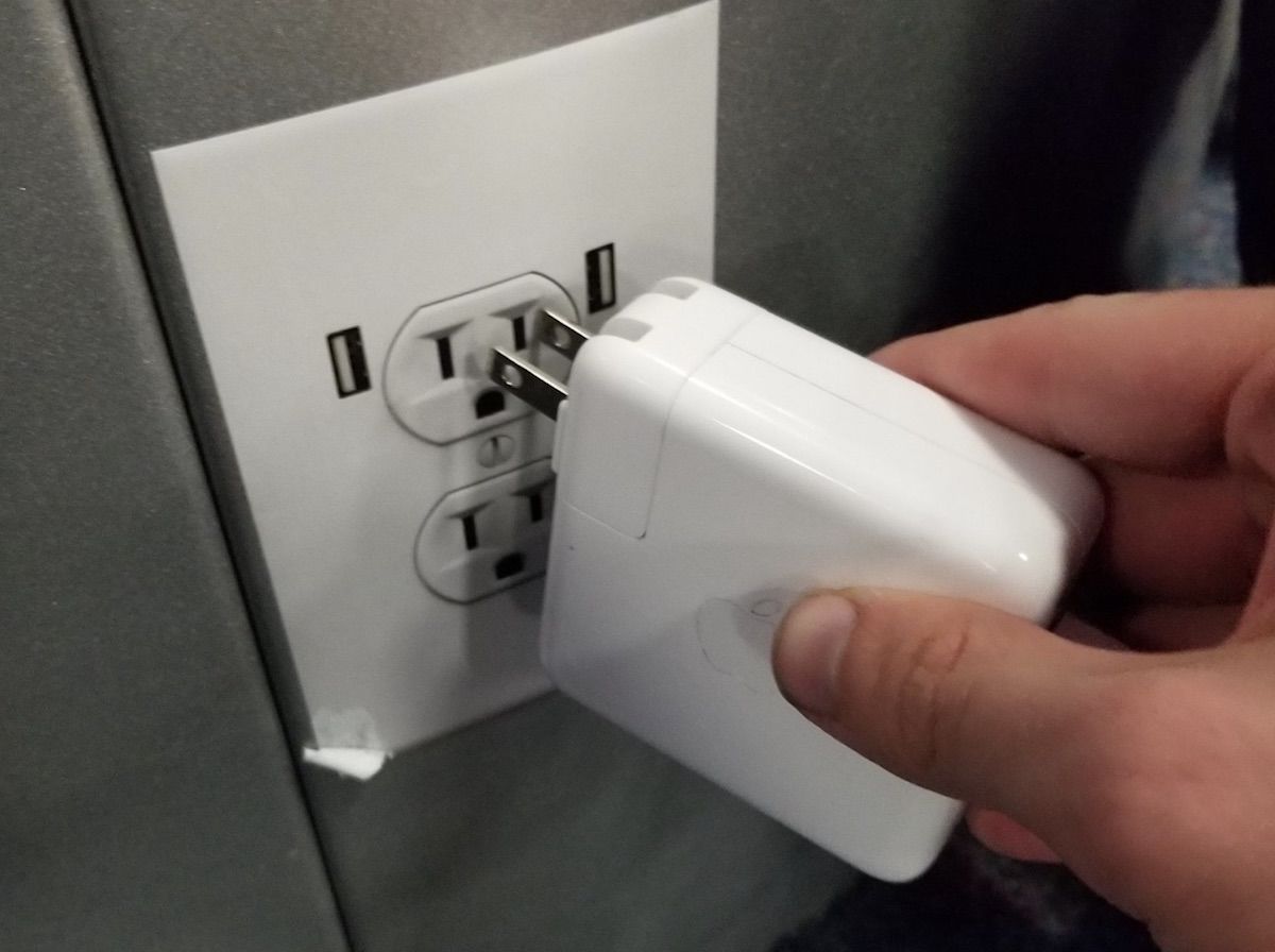Power Outlet Stickers Are Fooling Travelers At Airports Across The Nation