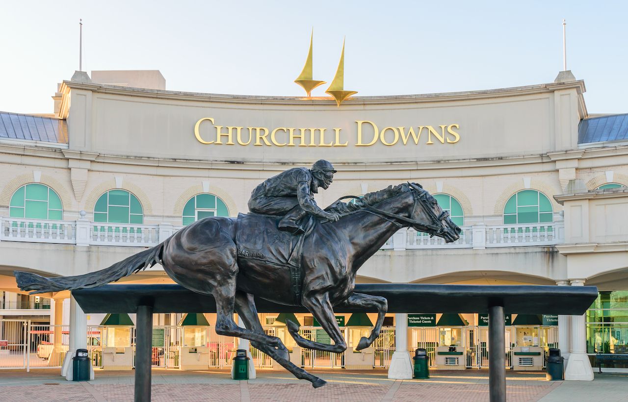 Entrance to Churchill Downs featuring a statue of Kentucky Derby Champion Barbaro