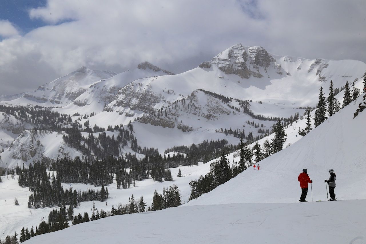 Two people skiing in Jackson Hole, Wyoming