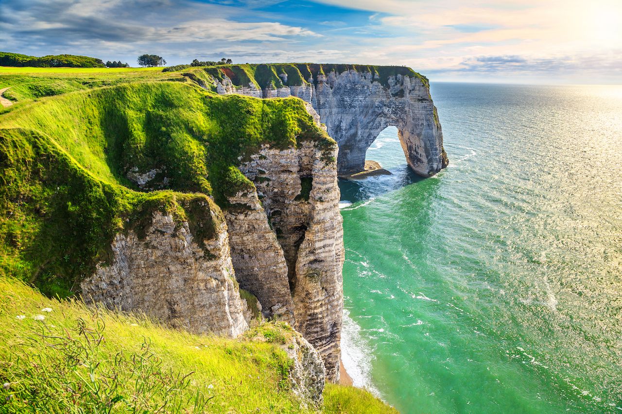Spectacular natural cliffs Aval of Etretat and beautiful famous coastline, Normandy, France