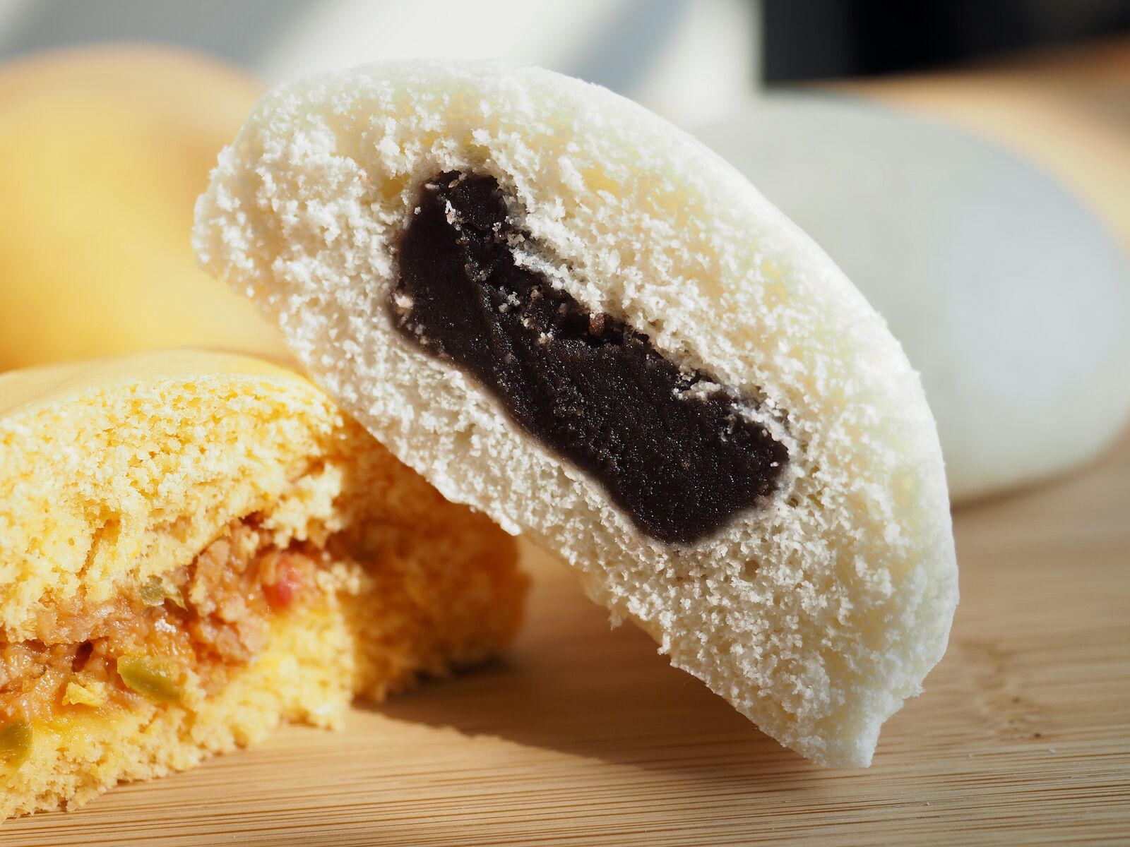 A hoppang cake cut in half to show red bean paste