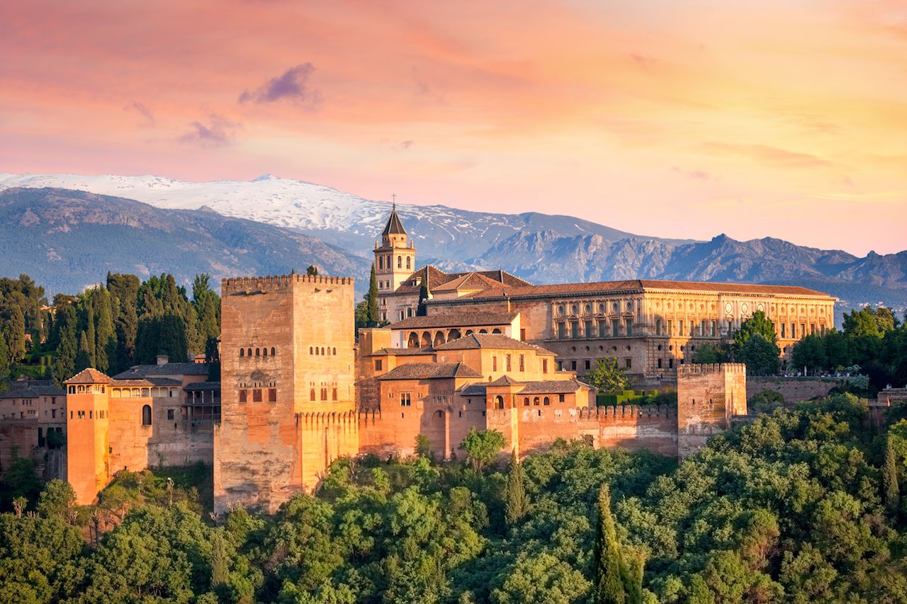 Ancient arabic fortress Alhambra at the beautiful evening time, Granada, Spain