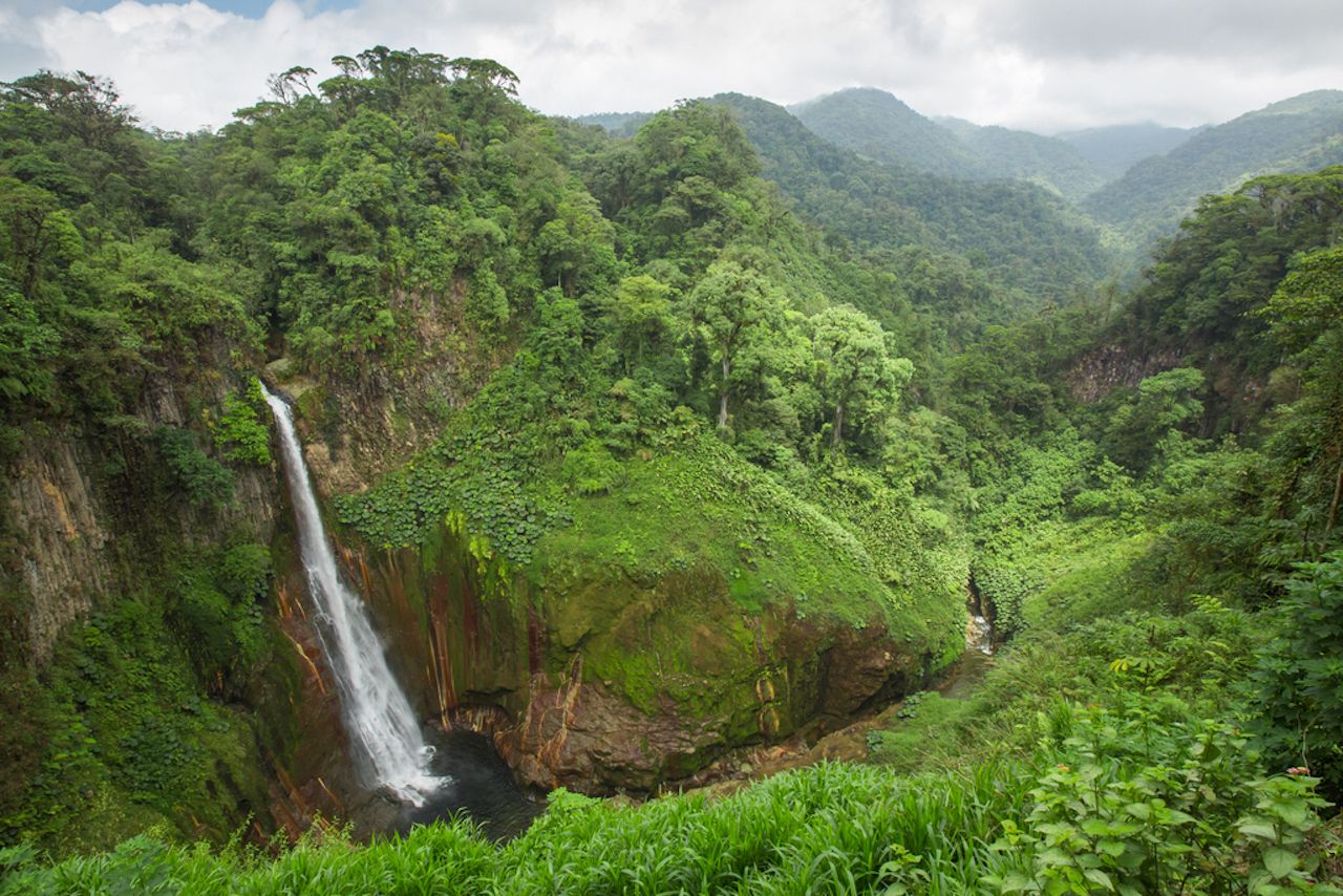 Lush Costa Rican landscape and one of costa rica waterfalls