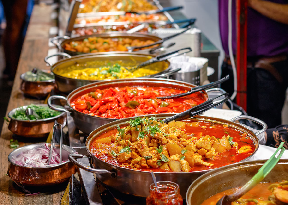 Variety Of Cooked Curries On Display At Camden Market In London 1200x853 