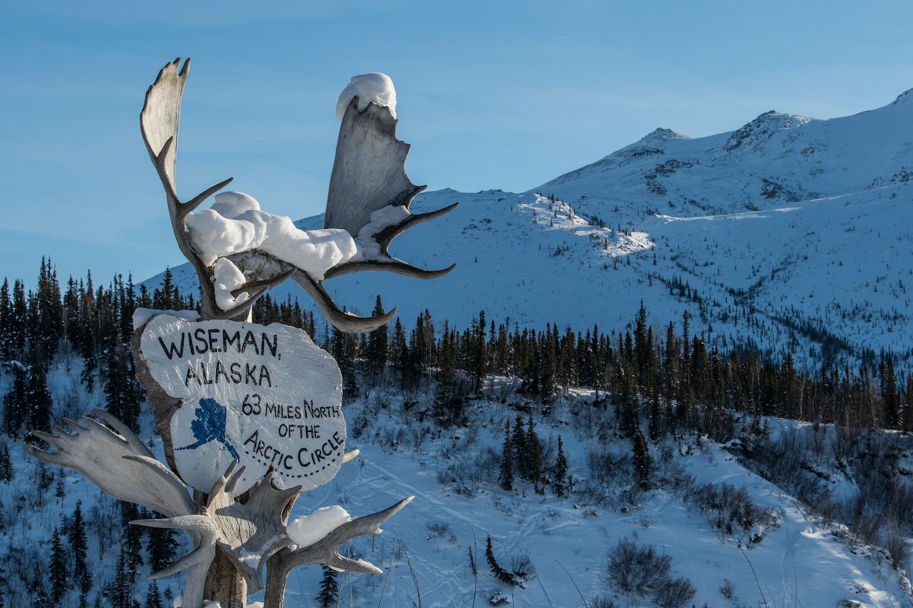 The marker for Wiseman Village, a necessary stop for rest and supplies while driving the Dalton Highway