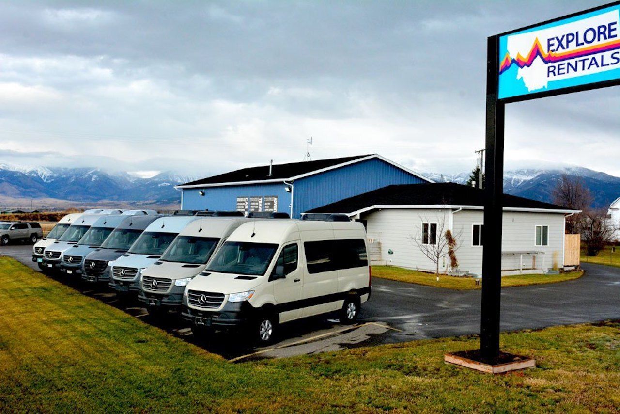 A line of 2019 4x4 Mercedes Sprinter Vans for rent in Montana