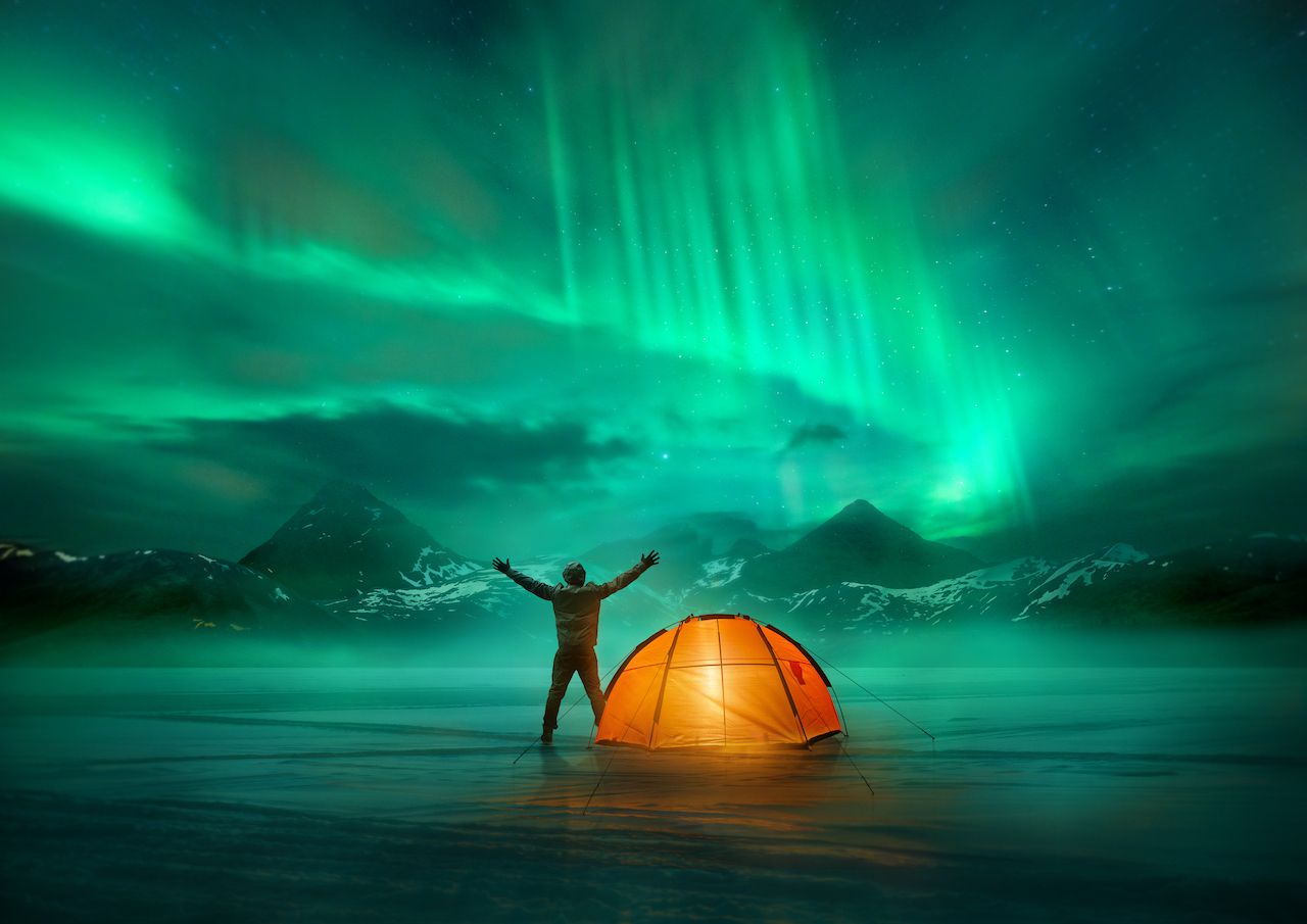 Camping under northern lights
