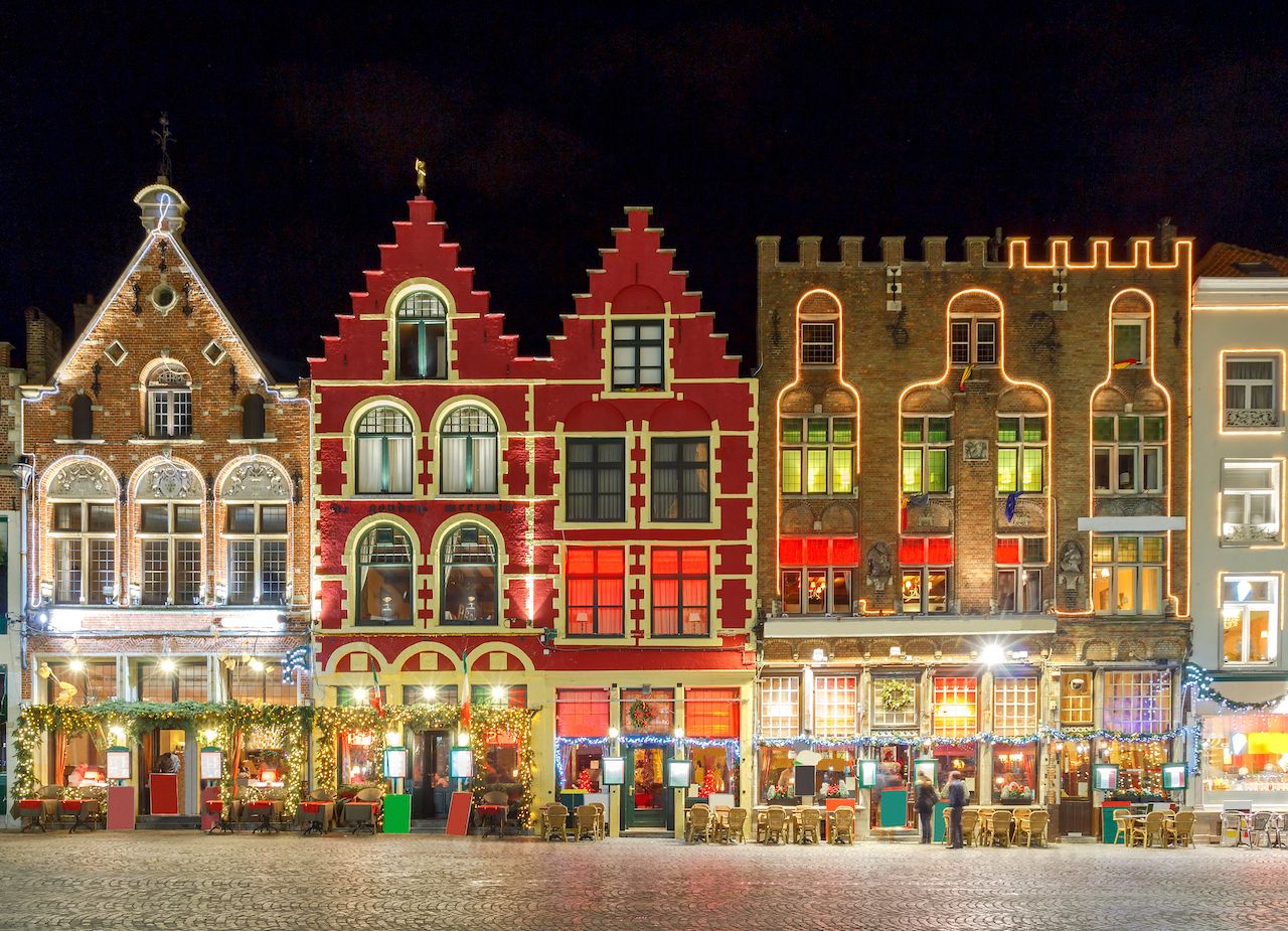 A holiday market in Bruges, one of the best destinations for Christmas in Europe