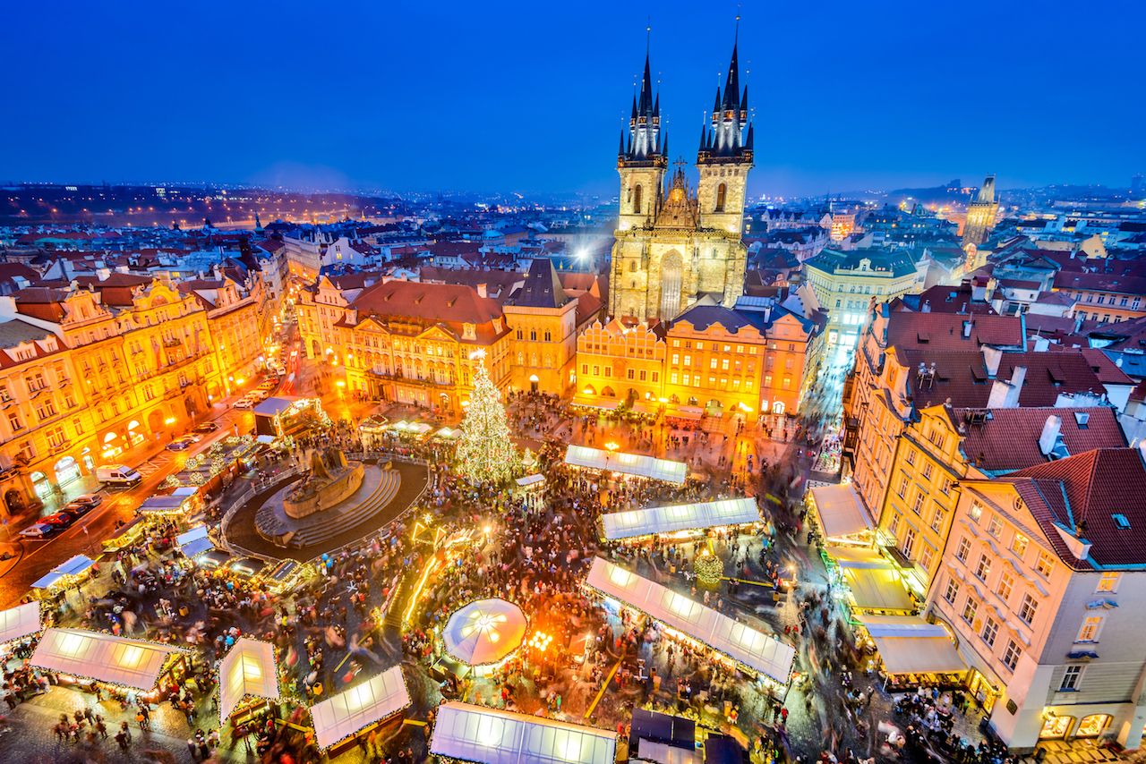 Aerial view of the Christmas square in Prague lit up at night