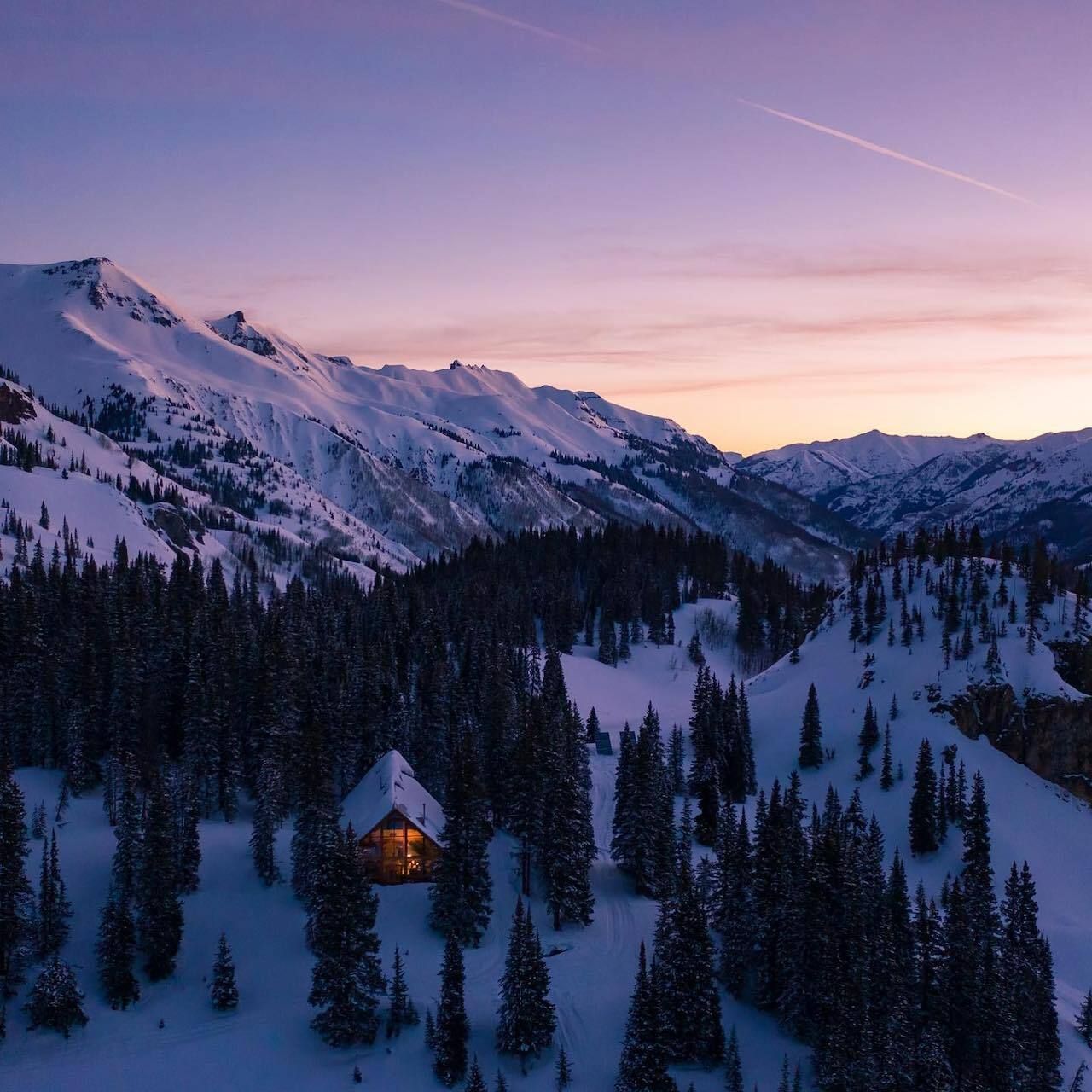 Bird's-eye view of Red Mountain backcountry lodge in the winter