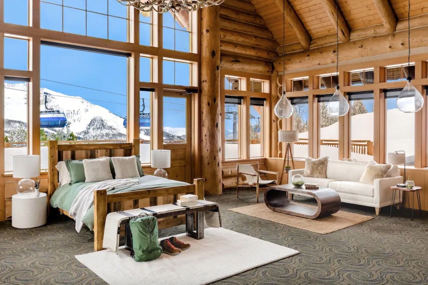 Airbnb Andesite Mountain in Big Sky, Montana parallel view of bedroom and living room, airbnb montana mountain stay