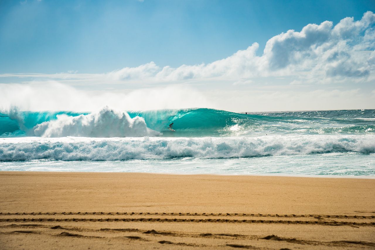 surfing in hawaii - bonsai pipeline