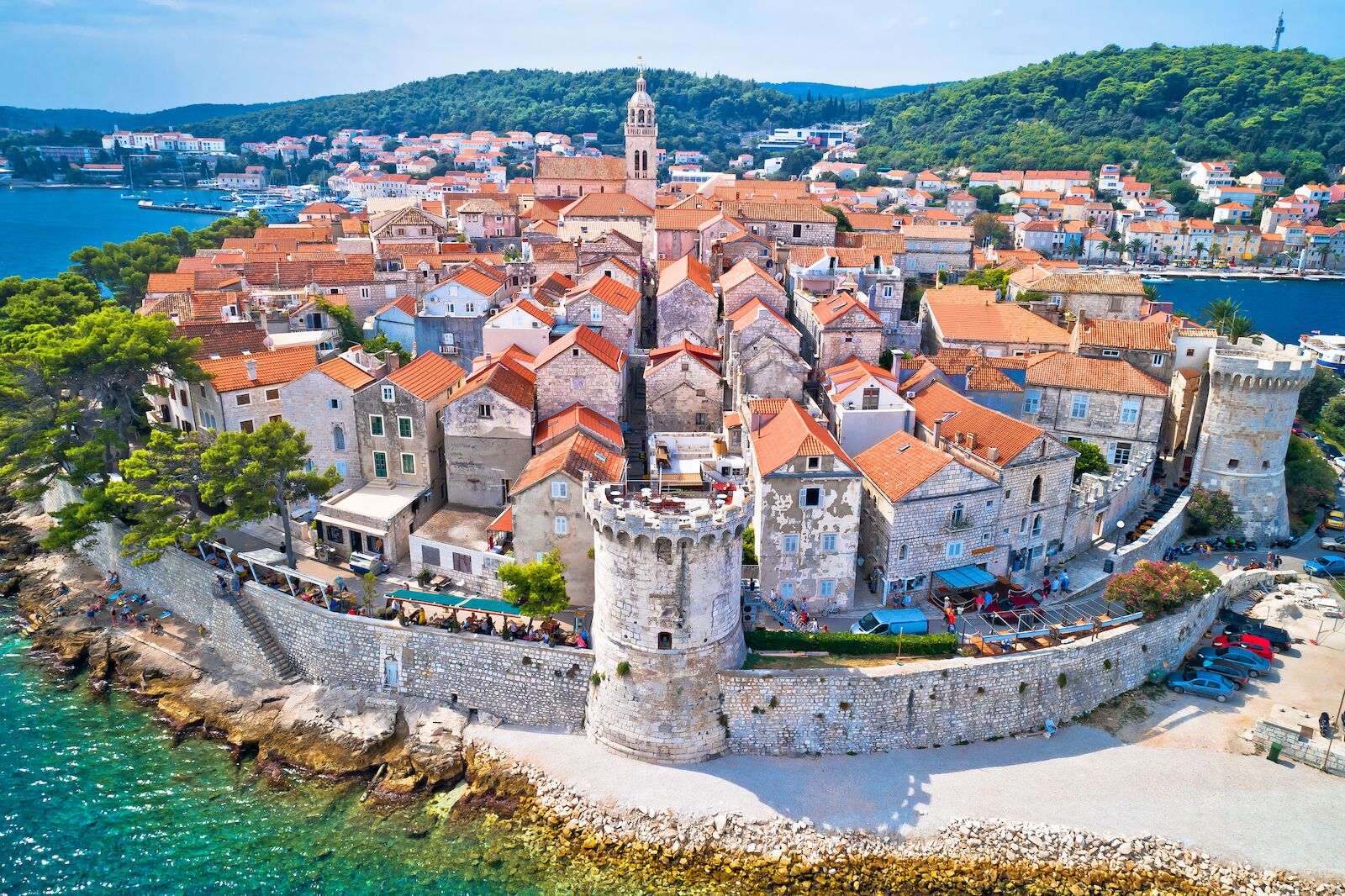 The walled city of Korcula on Korcula Island, with red tiled roofs, where people go for day trips from Dubrovnik