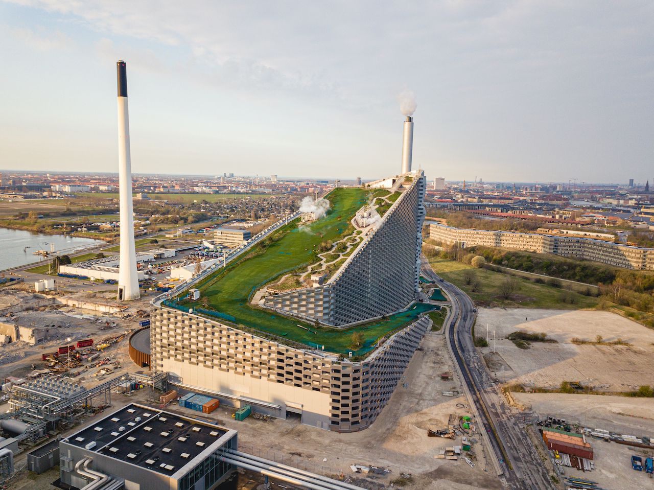 Copenhagen, Denmark - April 12, 2020: Aerial drone view of Amager Bakke, a waste to power plant with a ski slope on top., Denmark architecture