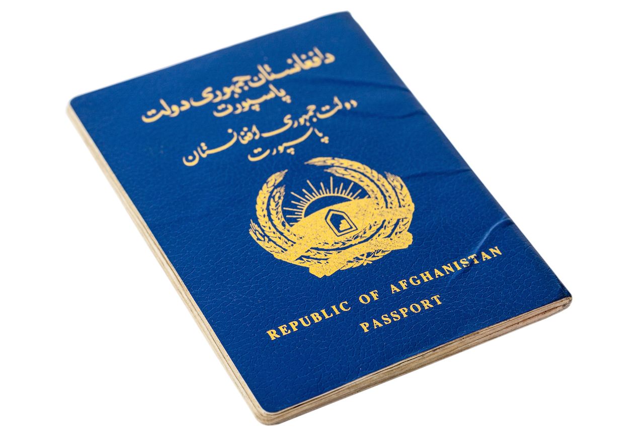 Republic of Afghanistan passport isolated on white background, weakest passports